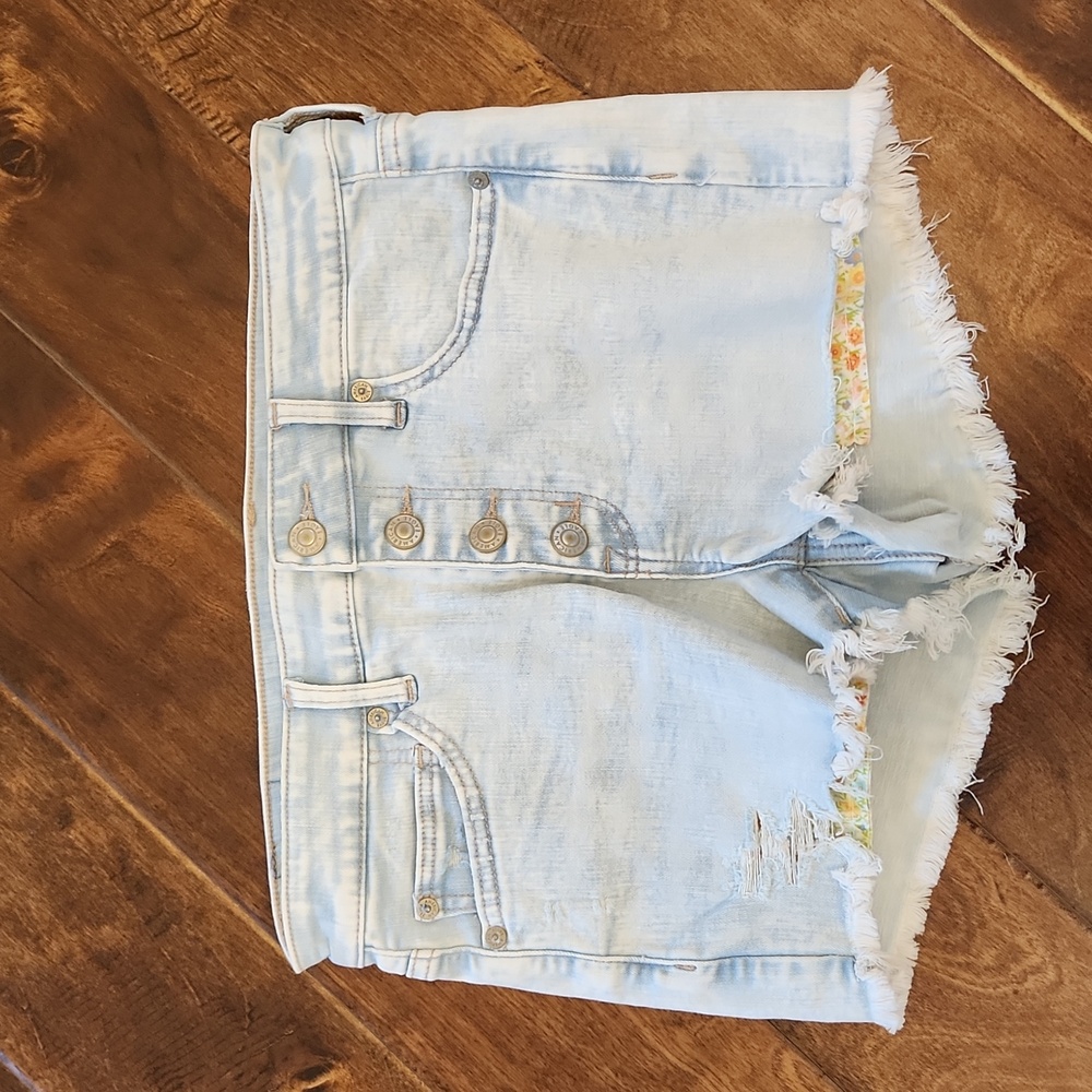 American Eagle Next Level Stretch High-Waisted Distressed Denim Shorts